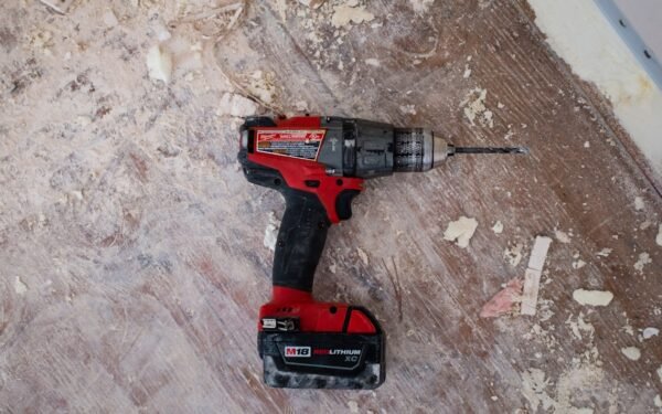 DIY woodworking workshop with precision miter saw and wooden boards