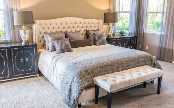 Serene minimalist bedroom with natural linen duvet and soft ambient lighting