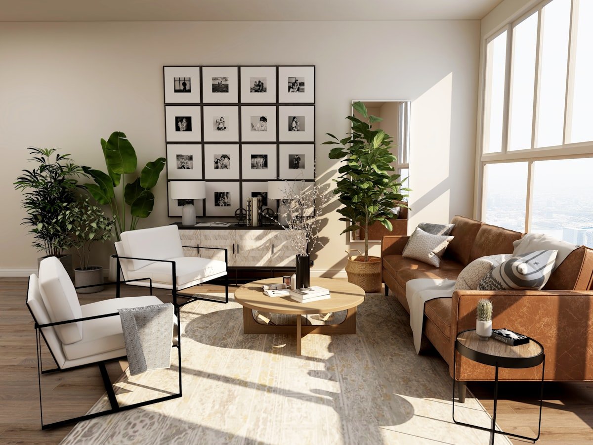 Airy modern living room with large window, cream sofa, and natural light